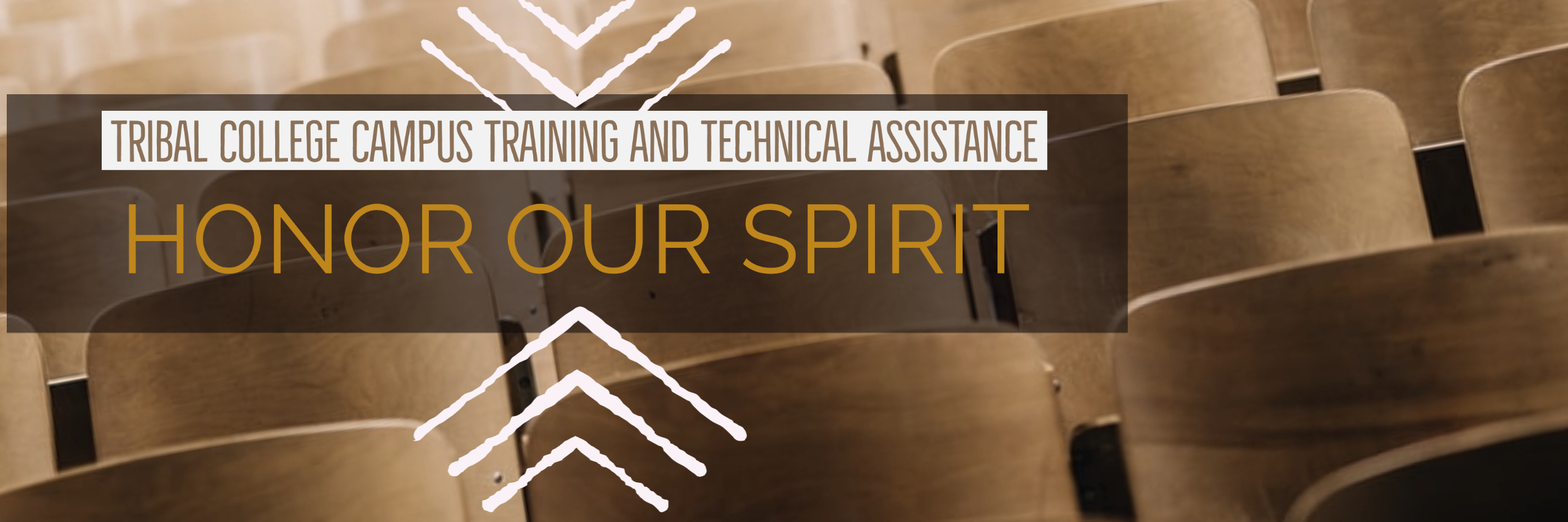 image of classroom desks, text "Tribal College Training and Technical Assistance, Honoring Our Spirit"